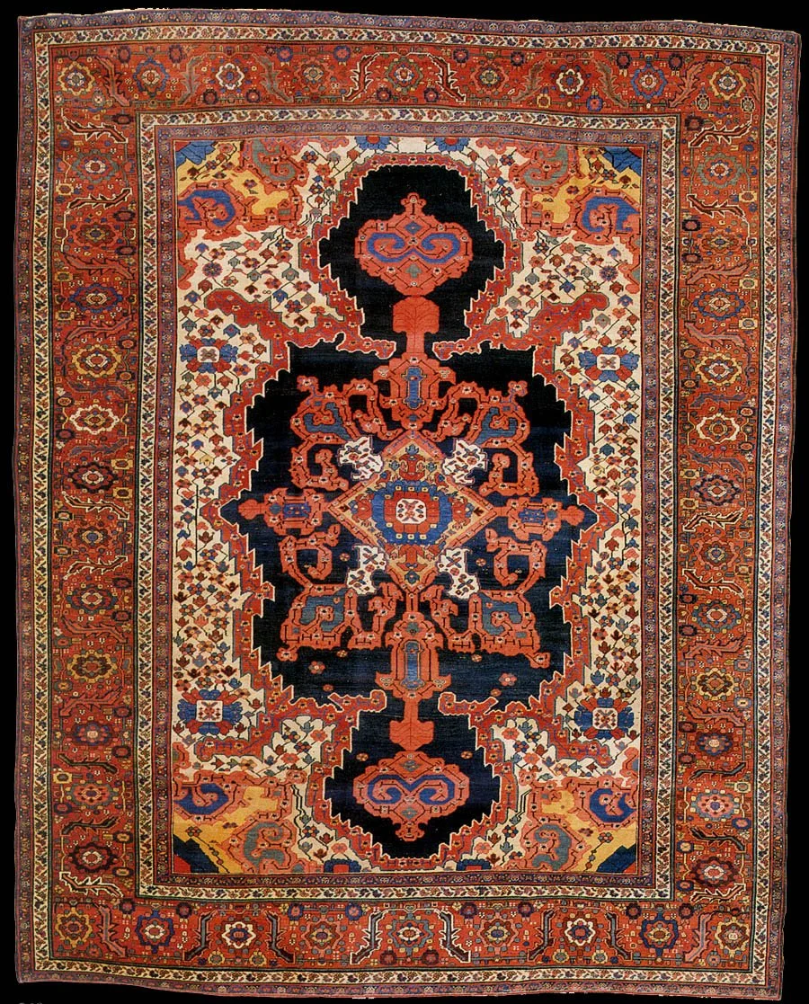 Antique Phoniex and dragon bakshaish carpet, a staple of seasoned collectors